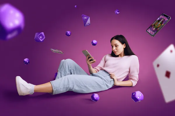 SPINARA Slots — Thousands of thrilling machines await A woman smiling by bright slot machines showing lucky symbols, showcasing the exciting slot offerings at SPINARA.